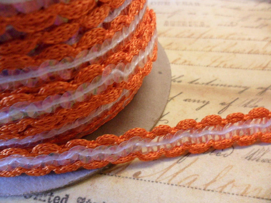 Orange scalloped crochet trim with iridescent sequins 3/8 wide
