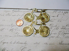 Load image into Gallery viewer, Gold Embossed Foil German Dresden Scrap Bicycles - approx 1.75&quot; tall X 2.75&quot; wide /set of 2
