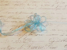 Load image into Gallery viewer, Aqua Blue Pull String Organza Ribbon with Iridescent Center   Approx 1/8&quot; Wide
