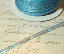 Load image into Gallery viewer, Aqua Blue Pull String Organza Ribbon with Iridescent Center   Approx 1/8&quot; Wide
